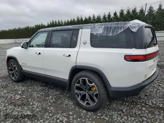 2023 Rivian R1S Adventure with VIN 7PDSGABA6PN017889, listed as a Copart auction lot 68860864 with 7,661 mi miles and Salvage Title. Bid and sale history available at carsss.com. Image 2.