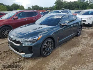 2023 Kia Stinger GT2 with VIN KNAE55LC5P6125753, listed as a Copart auction lot 61751394 with 23,747 mi miles and Salvage Title. Bid and sale history available at carsss.com. Image 1.