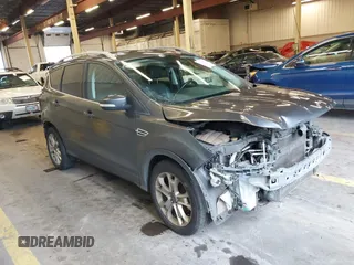 2016 Ford Escape Titanium with VIN 1FMCU9J92GUB63525, listed as a IAAI auction lot 41469824 with 156,773 mi miles. Bid and sale history available at carsss.com. Image 1.