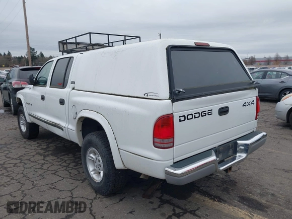 2000 Dodge Dakota Sport with VIN 1B7GG2AN2YS760690, listed as a IAAI auction lot 41616767 with 225,478 mi miles and . Bid and sale history available at carsss.com. Image 3.