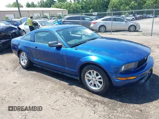 2007 Ford Mustang Deluxe with VIN 1ZVFT80N275369254, listed as a IAAI auction lot 42576683 with 58,987 mi miles and . Bid and sale history available at DreamBid. Image 1.