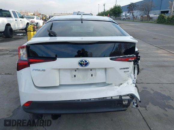 2021 Toyota Prius L Eco z VIN JTDKAMFU9M3131228, wystawiony jako IAAI lot #41257117 z przebiegiem 72 840 mil mil oraz . Historia ofert i sprzedaży dostępna na DreamBid. Obrazek 17.