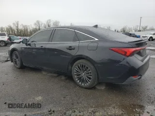2019 Toyota Avalon Limited Hybrid z VIN 4T1B21FB2KU005290, wystawiony jako Copart lot #87433804 z przebiegiem 92 909 mil mil oraz Szkoda całkowita • Salvage title. Historia ofert i sprzedaży dostępna na DreamBid. Obrazek 2.