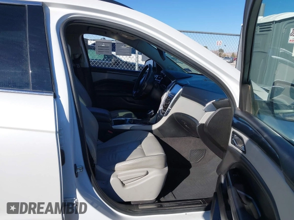 2015 Cadillac SRX with VIN 3GYFNAE34FS557297, listed as a IAAI auction lot 41388573 with 124,185 mi miles and . Bid and sale history available at DreamBid. Image 5.
