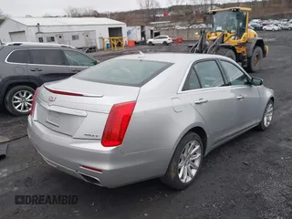 2014 Cadillac CTS Luxury AWD z VIN 1G6AX5SX3E0194895, wystawiony jako IAAI lot #41741824 z przebiegiem 197 042 mil mil oraz . Historia ofert i sprzedaży dostępna na DreamBid. Obrazek 4.
