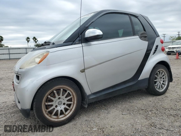 2011 Smart fortwo Pure with VIN WMEEJ3BA5BK438144, listed as a Copart auction lot 51934465 with 135,584 mi miles and Salvage title. Bid and sale history available at DreamBid. Image 1.