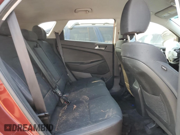 2019 Hyundai Tucson Value z VIN KM8J33A40KU002904, wystawiony jako Copart lot #51064805 z przebiegiem 71 435 mil mil oraz Szkoda całkowita • Salvage title. Historia ofert i sprzedaży dostępna na DreamBid. Obrazek 11.