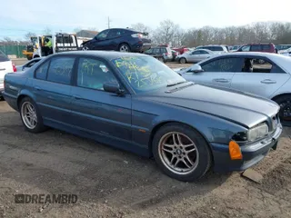 2000 BMW 7 Series 740iA with VIN WBAGG8348YDN77951, listed as a IAAI auction lot 41621509 with 999,999 mi miles. Bid and sale history available at carsss.com. Image 1.