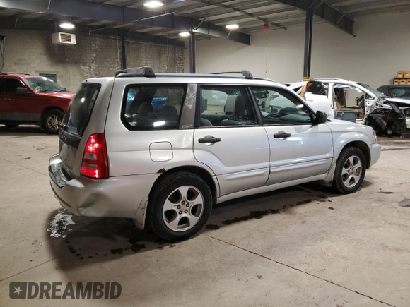 2003 Subaru Forester XS with VIN JF1SG65673H714885, listed as a Copart auction lot 74063684 with 298,649 mi miles and Salvage Title. Bid and sale history available at carsss.com. Image 3.