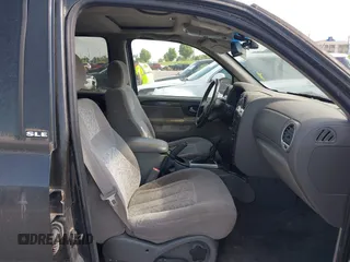 2003 GMC Envoy SLE z VIN 1GKDT13S832272692, wystawiony jako IAAI lot #42289095 z przebiegiem 215 210 mil mil oraz . Historia ofert i sprzedaży dostępna na DreamBid. Obrazek 5.