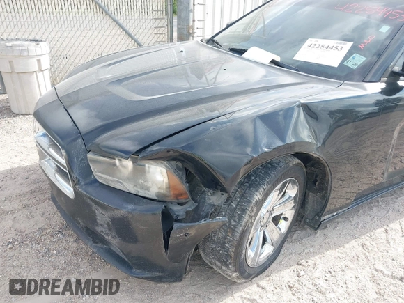 2013 Dodge Charger SE z VIN 2C3CDXBG4DH678292, wystawiony jako IAAI lot #42254453 z przebiegiem 269 450 mil mil oraz . Historia ofert i sprzedaży dostępna na DreamBid. Obrazek 6.