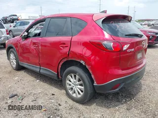 2016 Mazda CX-5 Sport with VIN JM3KE2BYXG0668401, listed as a IAAI auction lot 42370910 with Not provided miles and . Bid and sale history available at DreamBid. Image 3.