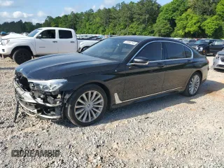 2017 BMW 7 Series 740i z VIN WBA7E2C57HG739482, wystawiony jako Copart lot #53652145 z przebiegiem 102 418 mil mil oraz Szkoda całkowita • Salvage title. Historia ofert i sprzedaży dostępna na DreamBid. Obrazek 1.
