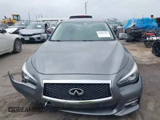 2015 Infiniti Q50 Premium z VIN JN1BV7AR7FM408015, wystawiony jako IAAI lot #42083301 z przebiegiem 58 817 mil mil oraz . Historia ofert i sprzedaży dostępna na DreamBid. Obrazek 12.
