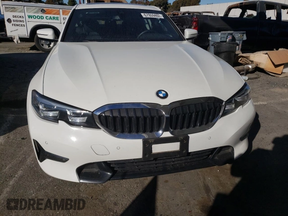 2020 BMW 3 Series 330i with VIN WBA5R1C02LFH48666, listed as a Copart auction lot 67959402 with 57,074 mi miles. Bid and sale history available at carsss.com. Image 5.