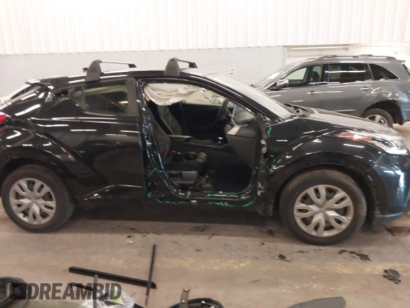 2021 Toyota C-HR LE with VIN JTNKHMBX0M1120864, listed as a IAAI auction lot 41911332 with 37,593 mi miles. Bid and sale history available at carsss.com. Image 14.