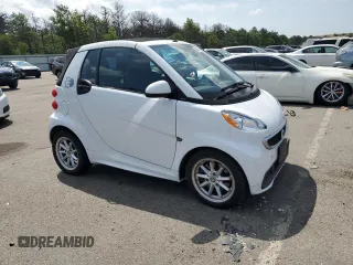 2014 Smart fortwo with VIN WMEEK9AA3EK806228, listed as a Copart auction lot 63858905 with 13,317 mi miles and Clean title. Bid and sale history available at DreamBid. Image 4.