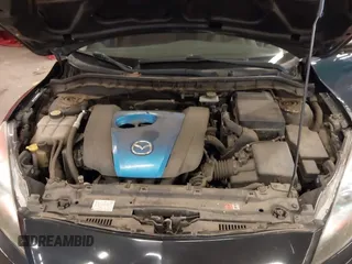 2012 Mazda Mazda3 i Touring with VIN JM1BL1V88C1540974, listed as a IAAI auction lot 41809430 with 121,334 mi miles. Bid and sale history available at carsss.com. Image 10.
