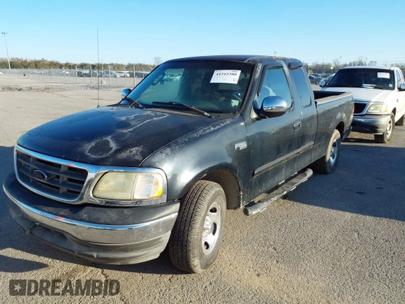 2002 Ford F-150 XL with VIN 2FTRX17282CA94608, listed as a IAAI auction lot 41215380 with 1 mi miles. Bid and sale history available at carsss.com. Image 2.