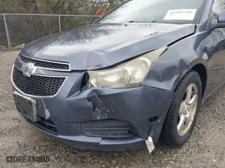 2014 Chevrolet Cruze 1LT with VIN 1G1PC5SB0E7213216, listed as a IAAI auction lot 41955710 with 147,003 mi miles. Bid and sale history available at carsss.com. Image 6.