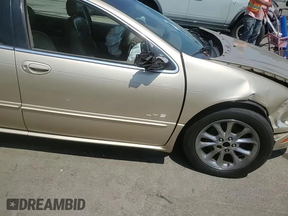 2001 Chrysler LHS z VIN 2C3HC56G41H544935, wystawiony jako Copart lot #59507714 z przebiegiem Nie podano mil oraz Szkody całkowita. Historia ofert i sprzedaży dostępna na DreamBid. Obrazek 11.