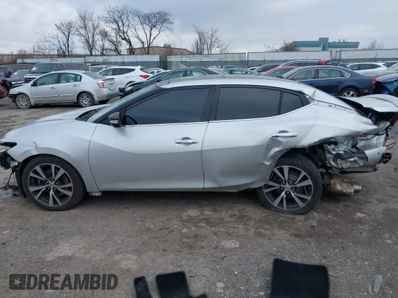 2016 Nissan Maxima SV with VIN 1N4AA6AP6GC416407, listed as a IAAI auction lot 41227003 with 125,781 mi miles and . Bid and sale history available at DreamBid. Image 14.