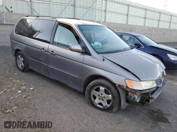2000 Honda Odyssey EX with VIN 2HKRL1861YH527864, listed as a Copart auction lot 51343745 with 262,483 mi miles and Salvage Title. Bid and sale history available at DreamBid. Image 4.
