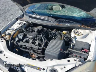 2004 Chrysler Sebring Limited with VIN 1C3EL65R84N390852, listed as a IAAI auction lot 40572807 with 100,975 mi miles and . Bid and sale history available at DreamBid. Image 10.