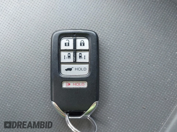 2014 Honda Odyssey Touring with VIN 5FNRL5H94EB079518, listed as a IAAI auction lot 42095098 with 141,019 mi miles and . Bid and sale history available at DreamBid. Image 11.