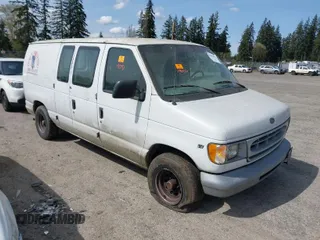 2000 Ford Econoline Cargo with VIN 1FTRE14W7YHA37668, listed as a IAAI auction lot 42001679 with 210,713 mi miles. Bid and sale history available at carsss.com. Image 1.