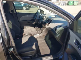 2014 Chevrolet Sonic LT with VIN 1G1JC6SB4E4151333, listed as a IAAI auction lot 41815985 with 112,123 mi miles. Bid and sale history available at carsss.com. Image 5.