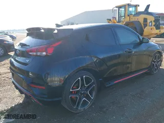 2021 Hyundai Veloster N with VIN KMHT36AH3MU010222, listed as a IAAI auction lot 41754524 with 25,128 mi miles. Bid and sale history available at carsss.com. Image 4.