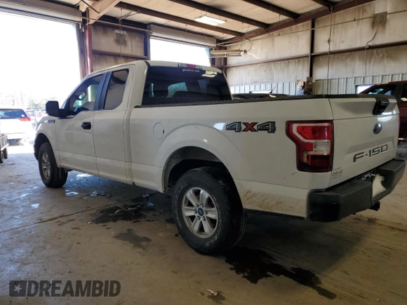 2018 Ford F-150 XL with VIN 1FTFX1E56JFC69571, listed as a Copart auction lot 45755715 with 156,830 mi miles and Salvage title. Bid and sale history available at DreamBid. Image 2.