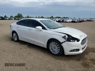 2014 Ford Fusion SE Hybrid with VIN 3FA6P0LU1ER308327, listed as a Copart auction lot 58127315 with 189,069 mi miles and Salvage title. Bid and sale history available at DreamBid. Image 4.