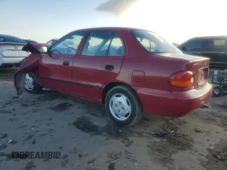 1997 Hyundai Accent z VIN KMHVF24N9VU356190, wystawiony jako Copart lot #85610774 z przebiegiem 91 707 mil mil oraz Tytuł czysty. Historia ofert i sprzedaży dostępna na DreamBid. Obrazek 2.