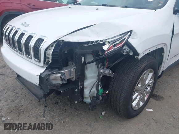 2016 Jeep Cherokee Latitude z VIN 1C4PJMCB3GW237461, wystawiony jako IAAI lot #42495278 z przebiegiem 102 417 mil mil oraz . Historia ofert i sprzedaży dostępna na DreamBid. Obrazek 6.