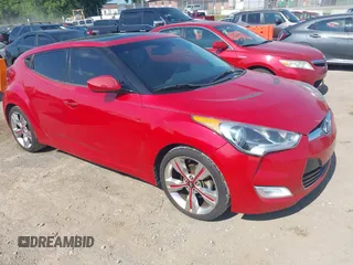 2013 Hyundai Veloster w/Red Int с VIN KMHTC6AD6DU124678, выставлен на аукционе IAAI как лот 42787063 с пробегом 145 716 миль миль и . История ставок и продаж доступна на DreamBid. Изображение 1.