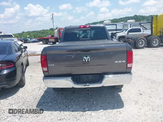 2019 Ram 1500 Big Horn z VIN 1C6RR7TT4KS516856, wystawiony jako IAAI lot #42479156 z przebiegiem 140 579 mil mil oraz . Historia ofert i sprzedaży dostępna na DreamBid. Obrazek 16.