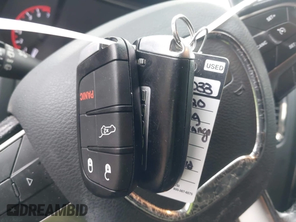 2020 Dodge Durango GT Plus z VIN 1C4RDJDG0LC309219, wystawiony jako IAAI lot #41473589 z przebiegiem 132 907 mil mil oraz . Historia ofert i sprzedaży dostępna na DreamBid. Obrazek 11.