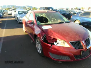 2010 Pontiac G6 w/1SB with VIN 1G2ZA5E08A4154156, listed as a IAAI auction lot 39436479 with 141,919 mi miles. Bid and sale history available at carsss.com. Image 6.