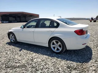 2014 BMW 3 Series 320i with VIN WBA3B1C55EK133687, listed as a Copart auction lot 63049945 with 95,604 mi miles and Salvage title. Bid and sale history available at DreamBid. Image 2.