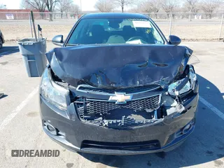 2014 Chevrolet Cruze 1LT with VIN 1G1PC5SB5E7482067, listed as a IAAI auction lot 41697625 with 51,036 mi miles and . Bid and sale history available at DreamBid. Image 6.