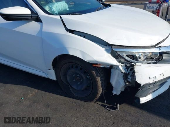 2018 Honda Civic LX with VIN 2HGFC2F56JH502770, listed as a IAAI auction lot 42117291 with 60,651 mi miles and . Bid and sale history available at DreamBid. Image 6.