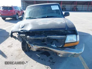 1999 Ford Ranger XL with VIN 1FTZR15V1XPA38040, listed as a IAAI auction lot 41762424 with 208,473 mi miles. Bid and sale history available at carsss.com. Image 12.