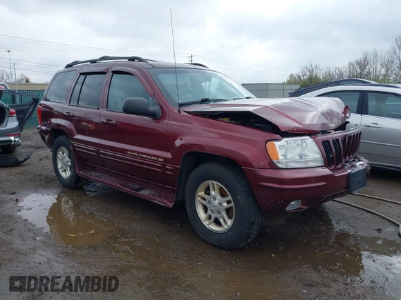 1999 Jeep Grand Cherokee Limited with VIN 1J4GW68N5XC642670, listed as a IAAI auction lot 41990199 with 154,492 mi miles. Bid and sale history available at carsss.com. Image 1.