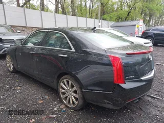 2013 Cadillac ATS Premium AWD z VIN 1G6AL5S36D0111869, wystawiony jako IAAI lot #42199637 z przebiegiem 148 404 mil mil oraz . Historia ofert i sprzedaży dostępna na DreamBid. Obrazek 3.