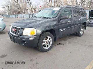 2005 GMC Envoy SLT with VIN 1GKDT13S352258833, listed as a IAAI auction lot 41525149 with 213,829 mi miles. Bid and sale history available at carsss.com. Image 2.