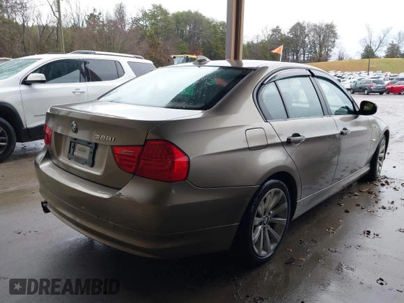 2011 BMW 3 Series 328i xDrive with VIN WBAPK7G53BNN49259, listed as a IAAI auction lot 41132387 with 135,398 mi miles. Bid and sale history available at carsss.com. Image 4.