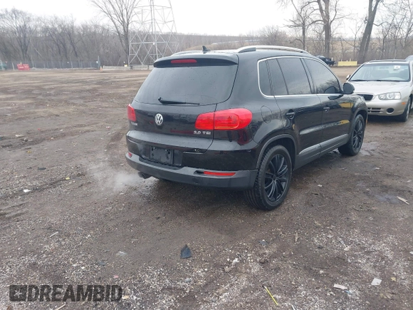 2012 Volkswagen Tiguan SE with VIN WVGAV7AX0CW602713, listed as a IAAI auction lot 41558520 with 95,678 mi miles and . Bid and sale history available at DreamBid. Image 4.