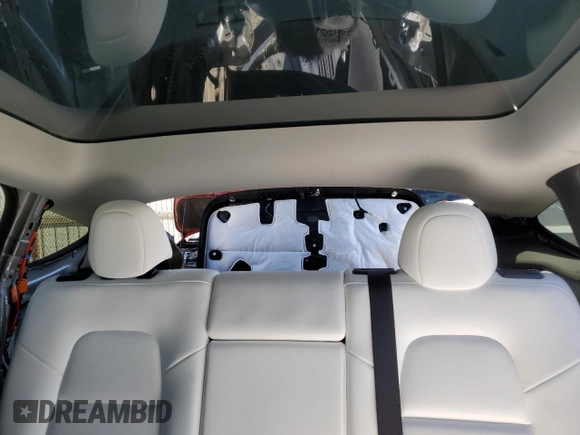 2023 Tesla Model Y Performance with VIN 7SAYGDEF0PF915030, listed as a Copart auction lot 50159375 with 19,772 mi miles and Salvage Title. Bid and sale history available at DreamBid. Image 10.